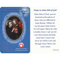 Healing Saint John of God is the Patron of those with High Blood Pressure,Heart Disease. This unique prayer card contains a third class relics on the front with the prayer on the back. The piece of cloth has been touched to his relics.