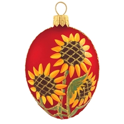 This stunning red egg with sunflowers ornament will make a sunsational addition to your Christmas tree this year! Set against a vibrant red satin finished background, our sunflower design is truly eye-popping.
