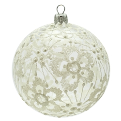 Beautiful see through glass ornament decorated in floral snowflakes.