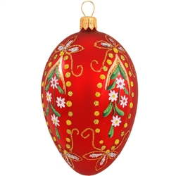 Truly eggceptional, this gorgeous glass design is artfully hand-painted with a myriad of vibrant glazes and shimmering glitter accents. Masterfully crafted in Poland, our 3½" tall red egg ornament with flower designs is simply egg-quisite!
