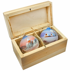 Hand painted glass ornaments in a deluxe painted wooden box. Magnetized lid. Hand made so no two ornaments or boxes are exactly the same. Ornaments are approx 2.25" in diameter.