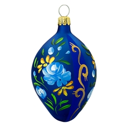 Italian craftsmanship is evident in this egg-ceptional design! Hand-painted with a vibrant mix of colorful florals and stripes, our 2½" tall blue glass egg is sure to enhance your décor for many seasons to come