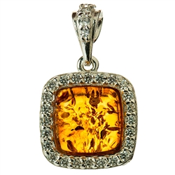 Beautifully designed classic silver setting for these honey shaded amber stones surrounded by Cubic Zirconia crystals