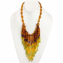 Bozena Przytocka is a designer of artistic amber jewelry based in Gdansk, Poland. Here is a beautiful example of her ability to blend amber, amethyst and peridot to create a stunning necklace.