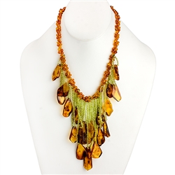 Bozena Przytocka is a designer of artistic amber jewelry based in Gdansk, Poland. Here is a beautiful example of her ability to blend amber and peridot  to create a stunning necklace.