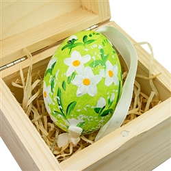 Hand painted duck egg nested inside a hand painted wooden box with a matching floral scene. The duck egg is blown out and comes with a ribbon hanger. Magnetized lid. Hand made so no two eggs or boxes are exactly the same.