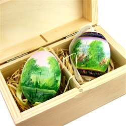 Beautifully hand painted duck eggs inside a hand painted wooden box. The duck eggs have been blown empty and come with their own hangers. They come nested inside this beautiful box. Magnetized lid. Hand made so no two eggs or boxes are exactly alike.