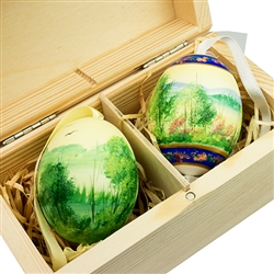 Beautifully hand painted duck eggs inside a hand painted wooden box. The duck eggs have been blown empty and come with their own hangers. They come nested inside this beautiful box. Magnetized lid. Hand made so no two eggs or boxes are exactly alike.