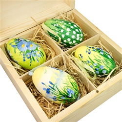 Hand painted goose eggs featuring Polish floral scenes and nested inside a hand painted wooden box with a matching floral scene.  The goose eggs are blown out  and come with a ribbon hanger.  Magnetized lid.  Hand made so no two eggs or boxes are exactly