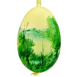 This beautiful hand painted goose egg comes ready to hang. The eggs have been emptied and strung through with ribbon for hanging. No two eggs are exactly alike and ribbon colors vary as well.