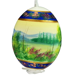 This beautiful hand painted duck egg comes ready to hang. The eggs have been emptied and strung through with ribbon for hanging. No two eggs are exactly alike and ribbon colors vary as well.