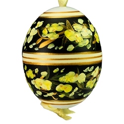 This beautiful hand painted duck egg comes ready to hang. The eggs have been emptied and strung through with ribbon for hanging. No two eggs are exactly alike and ribbon colors vary as well.