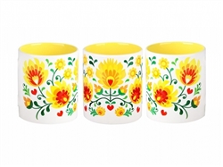 Colorful ceramic mug featuring a Polish paper cut pattern. Made in Poland.