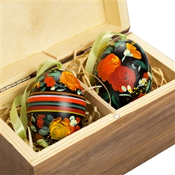 Beautifully hand painted duck eggs inside a hand painted wooden box. The duck eggs have been blown empty and come with their own hangers. They come nested inside this beautiful box. Magnetized lid. Hand made so no two eggs or boxes are exactly alike.