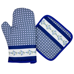 Colorful set of decorative mitt and holder set featuring a traditional Polish stoneware design. 100% polyester. These mitts are more decorative than useful as they do not have effective insulating material. Decorative only - not intended to handle heat.