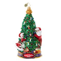 The Clauses make the perfect couple as they decorate for the biggest party of the year! Youï¿½ll smile in delight as you decorate your own Christmas tree with this Christopher Radko ornament that features a tree embellished with candles and garlands.