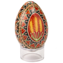 This beautifully designed and executed turkey egg is hand painted by our artist from Canada using the traditional batik method. The egg has been emptied through two small holes at each end of the egg. Stand sold separately.