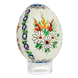 This beautifully designed chicken egg is hand painted by master folk artist Alina Wypchlo from Opole, Poland. Her colors are strong and bright. Look carefully and you will find humorous folk elements of nature incorporated into her designs (i.e. a cricket
