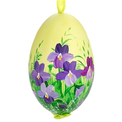 This beautiful hand painted goose egg comes ready to hang. The eggs have been emptied and strung through with ribbon for hanging. No two eggs are exactly alike and ribbon colors vary as well.