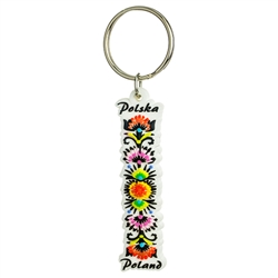 Attractive rubber key chain featuring a beautiful Lowicz floral pattern.