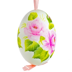 This beautiful hand painted duck egg comes ready to hang. The eggs have been emptied and strung through with ribbon for hanging. No two eggs are exactly alike and ribbon colors vary as well.