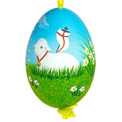 This beautiful hand painted goose egg comes ready to hang. The eggs have been emptied and strung through with ribbon for hanging. No two eggs are exactly alike and ribbon colors vary as well. Signed by the artist.