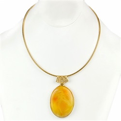 Beautiful custard amber cabochon suspended on a 24k gold vermeil slide necklace and held in a 24k gold vermeil frame.  Necklace is 17.5" long