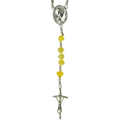 Custard amber rosary with a sterling silver cross of St John Paul II and silver medallion (St John Paul II and Our Lady Czestochowa).
The rosary has a clasp that opens to allow it to be worn around the neck.  Knotted between each bead. Bead shapes and