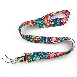 The folk lanyard is adorned with colorful flowers similar to those found on Tibetan highlander cloth. The motif is inspired by a traditional folk pattern known from the folk headscarf and the ladies' highlander attire.
