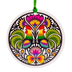 Folk art is the perfect souvenir from Poland. This ornament is inspired by the paper cuts from the Lowicz area of central Poland.