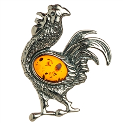 Our Polish sterling silver rooster is highlighted with a nice oval amber cabochon.  Rooster size approx 1.75" x 1.5".
