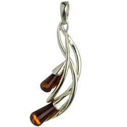 Drops of honey amber wrapped in silver in a calla lily shape. Stylish and unique.
