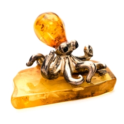 Our small sterling silver and amber octopus has just landed on an natural amber ledge. Hand crafted. Size approx 1.5" x 1.25" x .8"