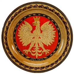 Hand Made in Southern Poland This beautiful plate is made of seasoned beech wood, from the Tatra Mountain region of Poland. The skilled artisans of this region employ centuries old traditions and meticulous craftsmanship to create a finished product of