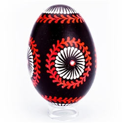 This beautifully designed goose egg is colored using the drop pull method and comes from the Bialystok region of northeast Poland. Eggs are blown and can last for generations. Goose eggs are stronger and larger than chicken eggs which makes them especiall