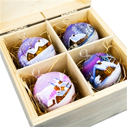 Hand painted glass ornaments featuring Polish country scenes in a deluxe painted wooden box. Hand made so no two ornaments or boxes are exactly the same. Ornaments are approx 2.25" in diameter.