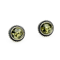 Charming sterling silver stud earrings with green amber center.  Size approx 1cm diameter.