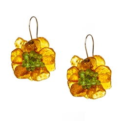 Bozena Przytocka is a designer of artistic amber jewelry based in Gdansk, Poland. Here is a beautiful example of her ability to blend amber and peridot.