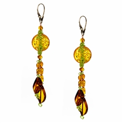 Bozena Przytocka is a designer of artistic amber jewelry based in Gdansk, Poland. Here is a beautiful example of her ability to blend amber and peridot to create a stunning set of earrings.