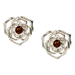 Gorgeous Baltic Amber round stud earrings surrounded with a rose shaped Sterling Silver setting.  Approx .5" diameter.