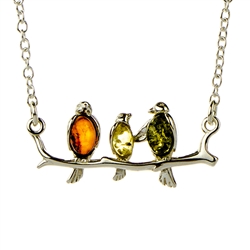 Beautiful sterling silver pendant decorated with multi-color amber cabochons and with an adjustable 18" - 20" sterling silver chain.