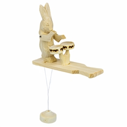Most of the Russian action toys feature bears in action. Here's an Old World wooden toy featuring Brer Rabbit. As the pendulum below this Russian action toy swings, the carved plays the drums in the most delightful fashion. It makes a nice addition to a