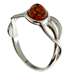 Medium size honey oval amber set in sterling silver.  Size approx .75" x .5".