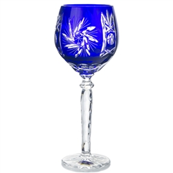 Beautiful cobalt blue Polish crystal wine glass.  Classic starburst cut pattern all done by hand in Poland. Size is approx 7.25" x 3" diameter at the top of the glass.