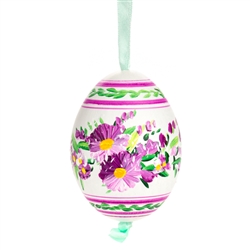 This beautiful hand painted duck egg comes ready to hang. The eggs have been emptied and strung through with ribbon for hanging. No two eggs are exactly alike and ribbon colors vary as well.