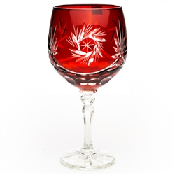 Beautiful ruby red Polish crystal wine glass. Classic starburst cut pattern all done by hand in Poland. Size is approx 7.25" x 3" diameter at the top of the glass.