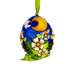 This beautifully designed chicken egg is hand painted and decorated. The figures are made from dried salt that is applied to the egg, formed, dried and finally painted. A  little work of art!