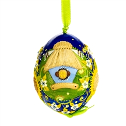 This beautifully designed chicken egg is hand painted and decorated. The figures are made from dried salt that is applied to the egg, formed, dried and finally painted. A  little work of art!