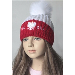 Display your Polish heritage!!  Whiteand red stretch ribbed-knit winter cap with the word Polska and an embroidered Polish Eagle.. Easy care acrylic fabric. Once size fits most. Made In Poland.