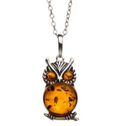 Our Polish sterling silver owl is highlighted with a nice oval amber cabochon center and eyes. Size approx 1.25" x .5".